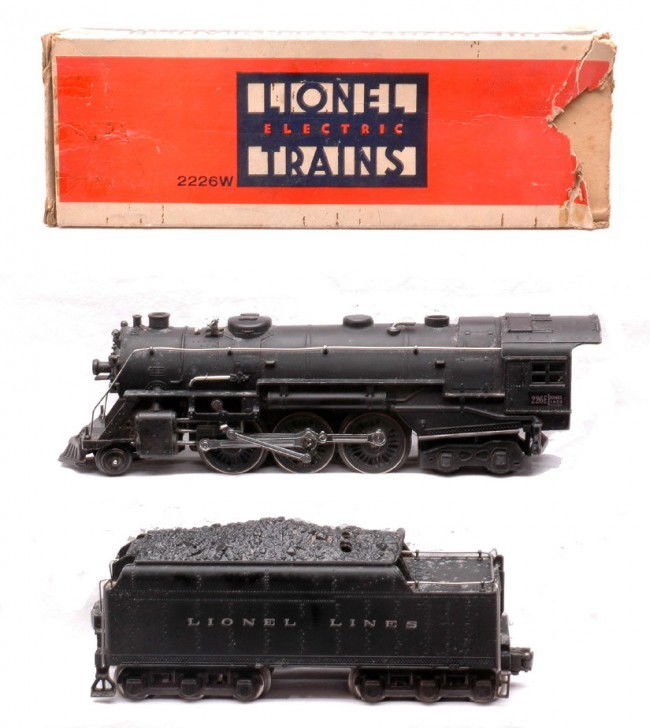 Lionel 226E Black Steam Loco 2226W Tender OB: Lionel prewar O gauge 226E black 2-6-4 steam loco and a 2226W tender in a worn OB with original cardboard insert. There is some oxidation on the paint on the loco and tender. There is a postwar couple