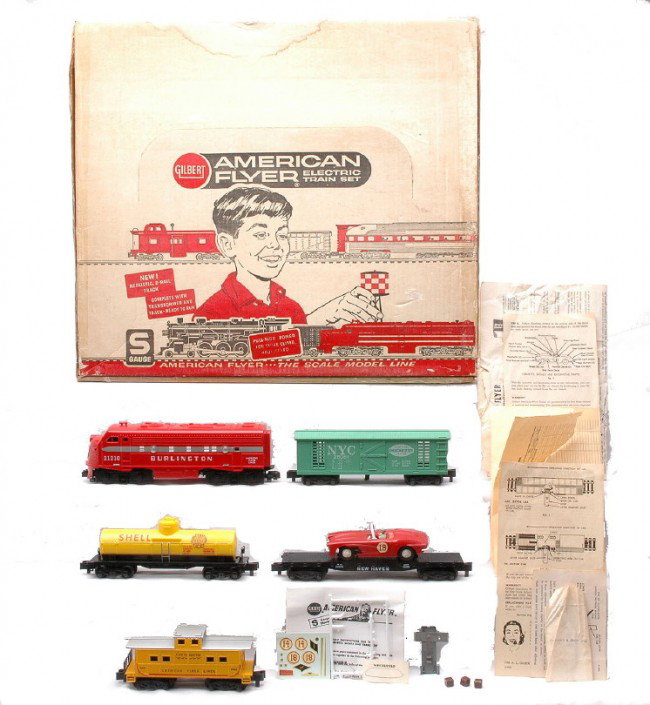 Am Flyer The Rocket Freight Set no. 20711 OB: American Flyer S gauge The Rocket freight set no. 20711, circa 1962 in OB with with original cardboard insert containing; 21210 Burlington EMD F-9 diesel, 24328 yellow Shell tank, 25081 NYC hay-jector