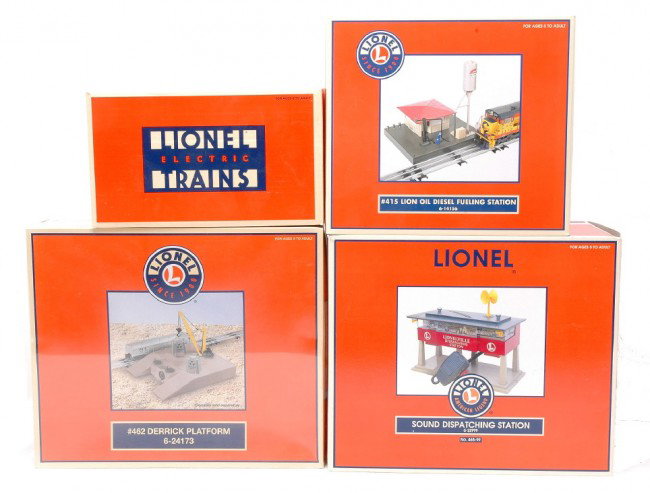 Lionel Accessories 12912 14156 22999 24173 MIB: Lionel accessories including; 12912 Lionelville operating pumping station, 14156 #415 Lion Oil diesel fueling station, 22999 sound dispatching station and a 24173 #462 derrick platform all in OBs, C10