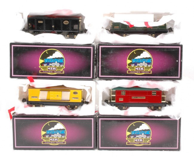 MTH TT Repro of Lionel 812 814 816 817 MINT OBs: MTH Tinplate Traditions reproduction of Lionel 800 series prewar O gauge boxcars with brass trim including; 10-1042 no. 812 dark green gondola, 10-1042 no. 814 yellow boxcar with brown roof, 10-1042 n