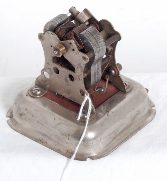 Gilbert 1915 P-54 motor with reverse: AC Gilbert 1915 P-54 motor. Scarce motor with P-58 motor and early P-59 reverse base plate. Motor shows some very light plating loss and very light rust. Base is clean with some very light plating los