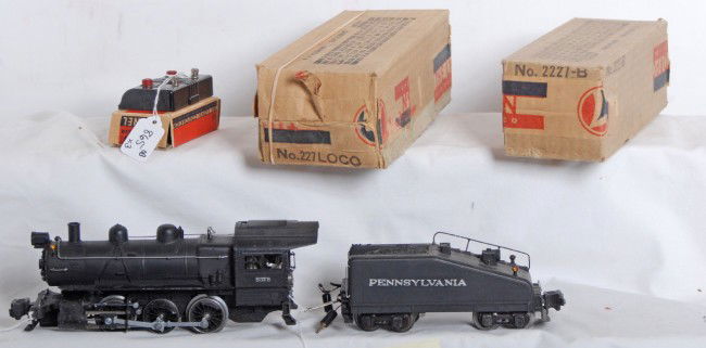 Lionel No. 227 steam switcher and 2227B tender in: Prewar Lionel O gauge No. 227 steam switcher locomotive with NO. 2227B bell ringing slope back tender with operating backup light. Trains look C7-8. Neither tender no loco have coupler keys. No. 169 X