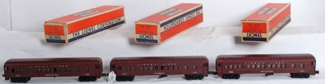 Lionel No. 2625 Madison, Manhattan, Irvington in O: Postwar Lionel O gauge No. 2625 passenger cars in original boxes with inserts and wrapping paper. Trains are Madison, Irvington and Manhattan Pullman cars. Madison car has a cracked shell, otherwise c