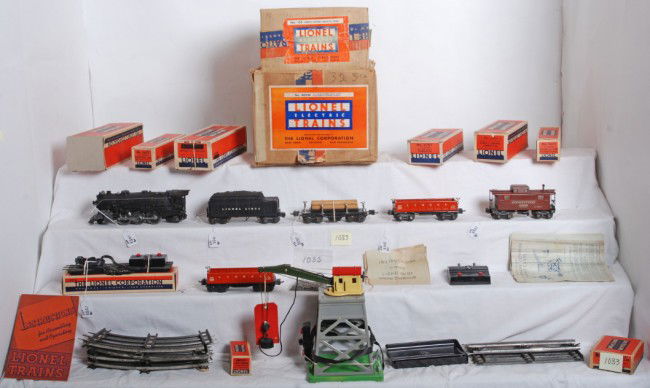 Lionel No. 869W freight train outfit in original: Prewar Lionel O gauge No. 869W freight train outfit with remote control whistle in original boxes. Trains are 225 loco, 2235W whistle tender, two 2652 gondolas, 3651 remote control lumber car, 2757 Pe