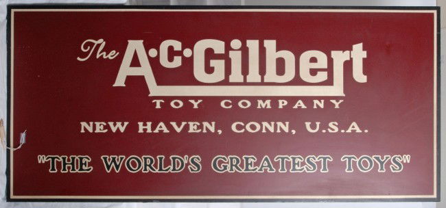 AC Gilbert Co. sign movie prop: AC Gilbert Company sign from ÒThe Man Who Saved ChristmasÓ Sign measures 60 inches wide by 30 inches tall. Sign shows light handing and some light scuffs on the face, also one shallow dent. Comes wi