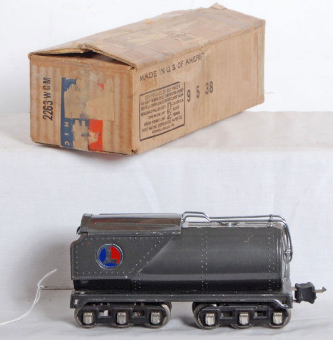 Lionel No. 2263WGM Vanderbilt in OB: Prewar Lionel O gauge No. 2263WGM Vanderbilt style tender in original box with insert. Tender looks great clean and shiny C6+. Box has older tape marks on top flaps, a little skinning to side panels.
