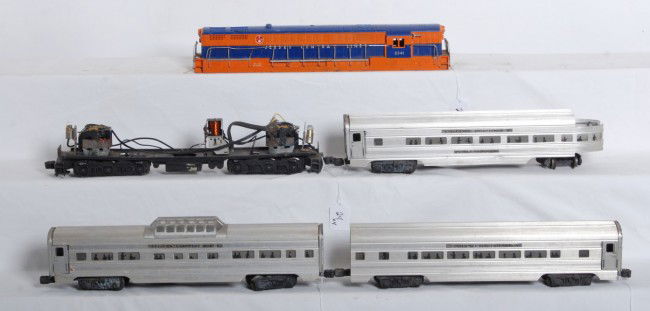 Lionel 2341 FM, 2531, 2532, 2533 aluminum pass.: Postwar O gauge Lionel No. 2241 FM Trainmaster, 2351, 2532 and 2533 aluminum passenger cars. Please view the photographs for the best description and as to the condition and diversity of the items in