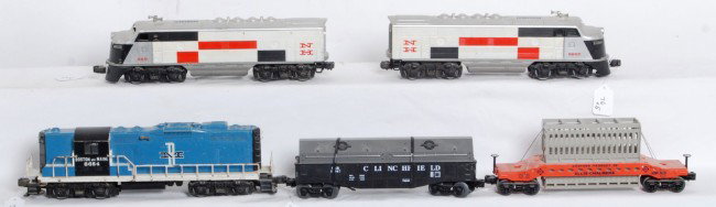 Lionel No. 8851, 8852, 8654, 9232, 16367: Postwar Lionel O gauge No. 8851 and No. 8852 New Haven F3 diesel A units, 8654 Boston and Maine GP diesel loco, 9232 Allis Chalmers car and 16367 Clinchfield gondola with coil covers. 8851 has a broke
