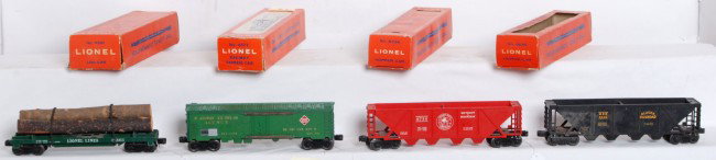Lionel No. 6361, 6572, 6736, 6636 in OB: Postwar Lionel O gauge Nos. 6361 log car, 6572 Railway Express Agency car, 6736 Detroit and Mackinac hopper and 6636 Alaska Railroad hopper, all in original boxes. Trains look C6 area. Boxes show mild