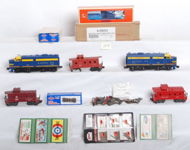 Mixed era lot of Lionel trains, 29204, 208 and mor: Lionel postwar and modern era O gauge toy trains. 208 Santa Fe Alco diesel A units, 6357 SP caboose, 6357 caboose, 1007 caboose. These trains are sold as is shown in our photos with no returns. Lionel