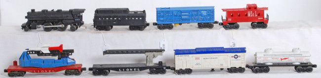 Lionel No. 242, 234W, 3376, 6650, 3665, 6463, more: Postwar Lionel O gauge No. 242 steam loco, 234W tender, 3376 Bronx Zoo giraffe car, 6650 rocket launcher, cherry picker (missing basket), 3665 Minuteman boxcar (left and right roof hatches), 6463 rock