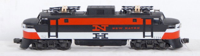 Lionel postwar EP-5 frame w/great repro. 2350 shel: Postwar Lionel O gauge EP-5 electric locomotive chassis with an absolutely great looking Reverse color New Haven 2350 reproduction shell. Shell looks C8-9, chassis looks C7 with clean battery compartm