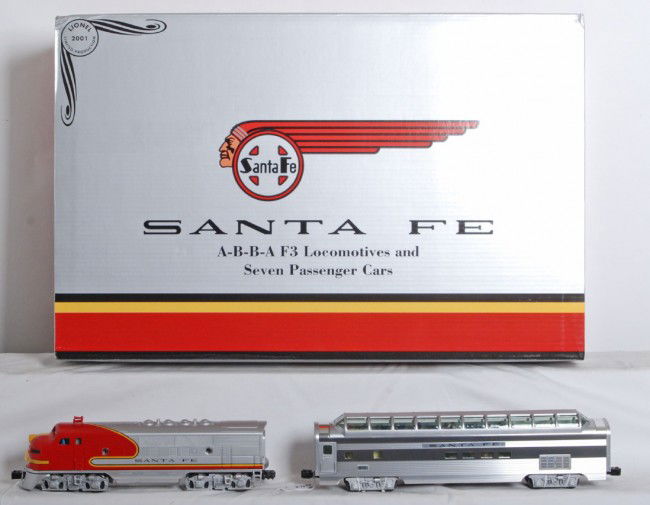 Lionel 21786 Santa Fe Super Chief set: Lionel modern O Gauge 21786 Santa Fe A-B-B-A F3 locomotives and seven Santa Fe aluminum passenger cars set in original box. This impressive set looks high C8-9. Set box shows light wear, inner boxes s