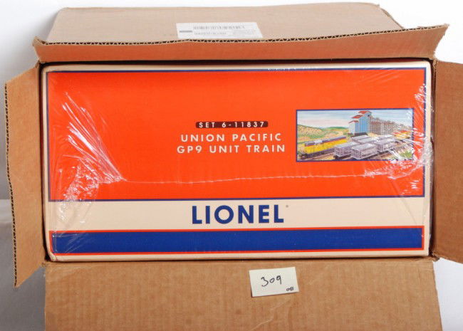 Lionel Union Pacific 11837 GP-9 set sealed: Lionel modern O Gauge 11837 Union Pacific GP-9 unit train set in OB. GP-9 loco features TMCC, Railsounds, Electrocouplers and much more. Also comes with six die cast ore cars and caboose. Sealed in fa