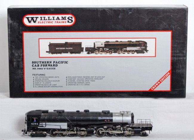 Williams SP brass cab forward loco only: Williams modern O Gauge bras 7002 Southern Pacific cab forward and original box. This lot is the loco only, no tender. Loco features smoke, electronic E unit, and much more. C8 condition with some she