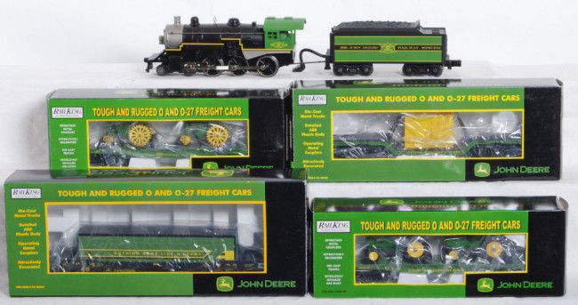 MTH John Deere Loco and cars: MTH modern O Gauge John Deere train set. Loco is 33-1011-1 and features Protosound 2.0, DCS control, Protosmoke, and much more. No OB for the loco otherwise C8. Cars include 30-7027B and 30-7028A flat