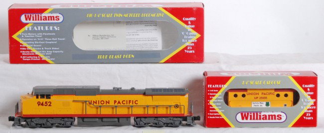 Williams Union Pacific Dash 9 with caboose: Williams modern O Gauge Union Pacific Dash 9 locomotive and N5C caboose in OBs. Loco is DA-606 and features true blast horn, dual motors, and more. Loco is C8. Caboose is CAB125 and is C8-9 condition.