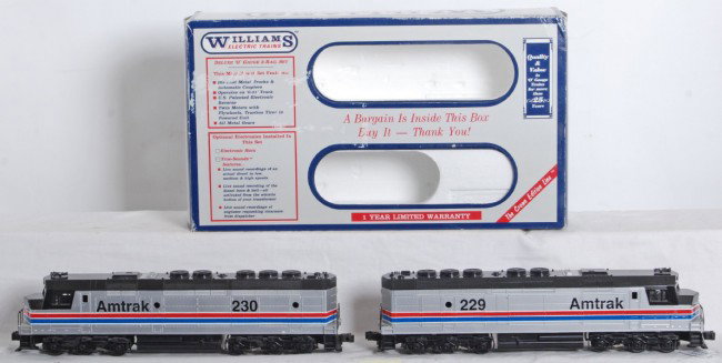 Williams Amtrak FP-45 A-A with sound: Williams modern O Gauge Amtrak FP-45 A-A set in OB. Catalog number FP200S. Dummy unit features sound. Powered unit has dual motors and electronic reverse. Locos are C8 condition. Set box is worn on co