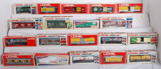 19 Lionel freight cars 9308, 9152, 9167, etc.: Lionel modern era freight cars in OBs. Nineteen cars including 9277 Cities Service tanker, 9166 Rio Grande caboose, 7802 Canada Dry boxcar, 9107 Dr. Pepper vat car, 9707 MKT cattle car, 9308 aquarium 