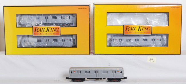 Railking R62 subway set with Proto 2 and add ons: MTH Railking modern O Gauge R62 subway set in OB. Set features Protosound 2.0, DCS control, Protocoupler and more. Catalog number 30-2671-1. C8 with some run time. OB has corner wear. Includes 30-2671