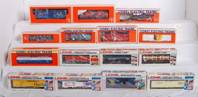 15 Lionel freight cars 29227, 9873, 19402, etc.: Lionel modern O Gauge freight cars in OBs. Fifteen cars include 29227 GG1 boxcar, 26991 ladder car, 16431 Lionel corp hopper, 5708 Amour reefer, 19402 Great Northern crane car, 16142 Santa Fe tank car