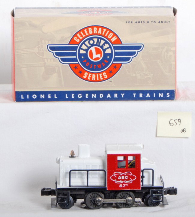 Lionel 18583 AEC 57 switcher with TMCC: Lionel modern O Gauge AEC 57 switcher in OB. Catalog number is 18583. Loco features TMCC, Directional lighting and more. Loco is C8 with run time.