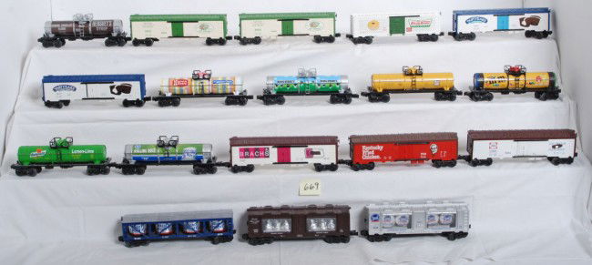 Various O Gauge food cars Hershey, Krispy Kreme, E: Various modern O Gauge freight cars. Cars are food related. Some Lionel, some K Line, some unmarked. 6449 York Peppermint mint car, 6478 Bud Light Vat, 6438 Hershey Kiss mint, 9894 Good Humor reefer,