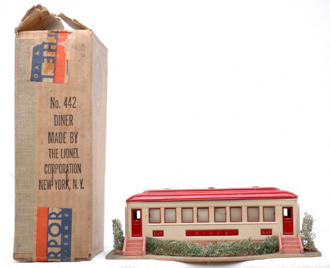 Lionel Prewar Landscaped Diner LN Boxed: Lionel prewar 442 landscaped diner in OB. The diner has a few light scratches on the roof, otherwise is C8. The OB is sealed on one end and the other end has all flaps attached.