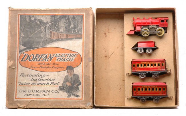 Dorfan Narrow Ga. Red Litho Pass Set no. 200 OB: Neat Dorfan prewar narrow gauge red lithographed passenger set no. 200 in set box with original cardboard insert containing; no. 50 red-enameled die cast 0-4-0 electric powered steam loco, type I four