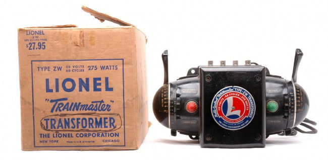 Lionel Type ZW 275-Watt Transformer Boxed: Lionel postwar type ZW 275-watt transformer in OB with two original cardboard inserts. Transformer is C7. The OB has all flaps attached and shows some wear.