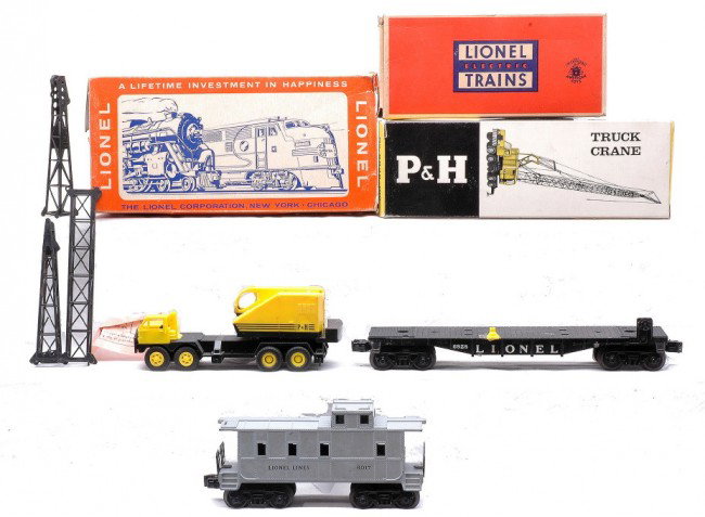 Lionel Freight Cars 6828 w/6828-100 6017 OBs.: Lionel postwar freight cars; 6828 Harnischfeger truck crane car with individual OB containing a 6828-100 Harnischfeger truck crane and a 6017 caboose in OBs. The 6828-100 truck crane is incomplete and