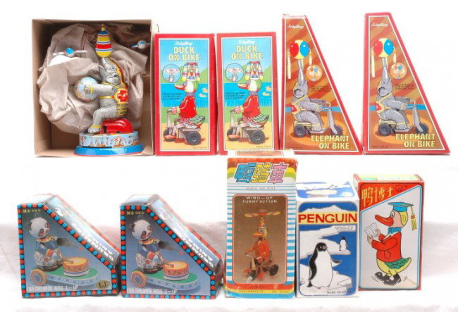 Selection of Wind-Up Toy Animals MINT OBs: Selection of wind-up toy animals including; Schylling two ducks on bikes and two elephants on bikes, elephant, Chinese made two drumming animals, Dr. Duck, penguin and a duck on bike all factory new i