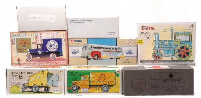 Selection of Toy Vehicles Corgi Marx Eastwood MIB: Large selection of toy vehicles including; Corgi Classics yellow bus, Eastwood Automobilia Ambulance, U. S. Army Willys, 1/2 ton, 4X4, Marx delivery truck, 1931 Ford Roadster Model A, Road Roller 1927