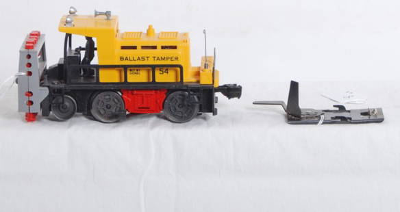 Lionel No. 54 ballast tamper: Postwar Lionel O gauge No. 54 ballast tamper with one track trip, C7.