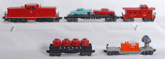 Lionel No. 627, 3620, 6424, 6112, 6357: Postwar Lionel O gauge No. 627 LV GE 44 ton diesel switcher, 3620 searchlight car, 6424 flatcar with original autos, 6112 gondola with four red canisters, 6357 SP type caboose, trains look nicer C6