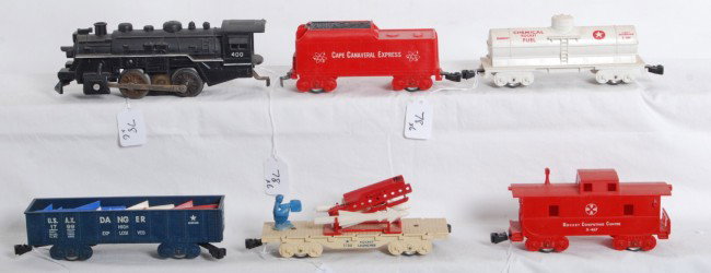 Great Marx 400 Cape Canaveral Express train: Great looking Marx Cape Canaveral Express freight train with No. 400 steam locomotive, Cape Canaveral Express tender, U.S.A.X. 1799 gondola with the card stock insert with missiles, X246 Chemical Rock