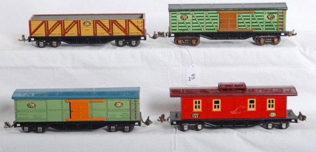 Lionel/Ives 1708, 1717, 1719, 1722 freight cars: Lionel and Ives prewar O gauge freight cars, 1708 stock car, 1717 gondola, 1719 boxcar, and 1722 caboose. Trains look C6+.