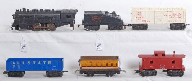 Marx 1666, 5532, 3280, 567, 564 Allstate steam loc: Postwar Marx O gauge No. 1666 Allstate steam locomotive and slope back tender, 5532 Allstate gondola, 3280 Santa Fe boxcar, 567 New York Central side dump car, and 564 Allstate caboose. Cars have some