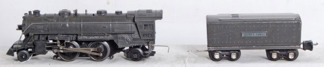 Lionel No. 229 steam locomotive and tender: Prewar Lionel O gauge No. 229 gun metal gray steam locomotive and tinplate tender without whistle, nice clean and shiny C6+.