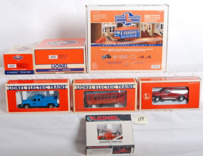 7 Lionel motorized units, cleaner, trolley set: Lionel modern O Gauge motorized units and more in OBs. Seven items total including 18436 Dodge Ram NYC inspection vehicle, 18424 on track pickup, 28442 PWC number 50 gang car, 18419 Lionelville trolle