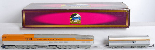 MTH C&O M-1 turbine upgraded to TMCC: MTH modern O Gauge Chesapeake and Ohio M-1 Turbine in OB. Catalog number is 20-3042-1. Loco has been upgraded to TMCC and steam type Railsounds (might be out of a Veranda) very neat loco in C7+ condit