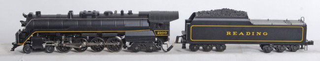 Lionel 18006 Reading T-1 locomotive: Lionel modern O Gauge 18006 Reading T-1 in OB. Loco features smoke, Railsounds, whistle and bell. OB has price sticker and shelf wear. Loco is high C8 with very light roller and wheel marks.
