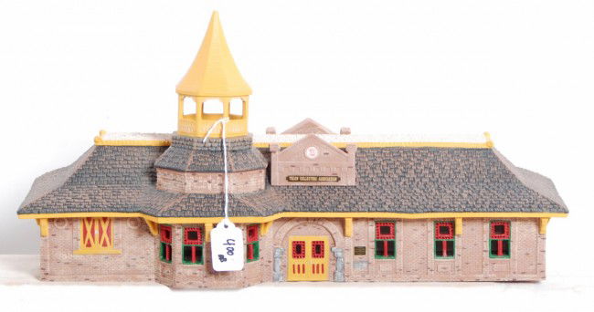 National Toy Train Museum model: Very nice O Gauge model of the TCA National Toy Train museum with all paperwork in OB. Includes all small accessories such as sign and potted plants. One baggage cart is broken, otherwise model looks