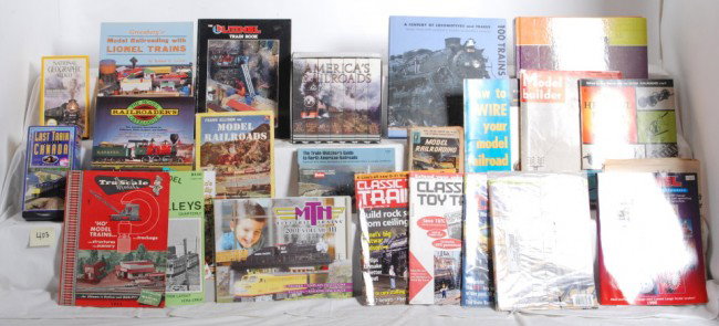 Lot of Toy Train books and railroad videos: Nice lot of Toy Train related books and railroad videos. Includes Model Railroading by Bantam, Frank Ellison on Model Railroading, The Model RailroaderÕs Catalogue by Corey, a few mixed issues of Cla