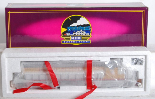 MTH Union Pacific SD-45 with Protosound: MTH modern O Gauge MT-2106LP Union Pacific SD45 in OB. Loco features Protosound, Protosmoke, directional lighting and more. Loco appears factory wrapped C9-10.