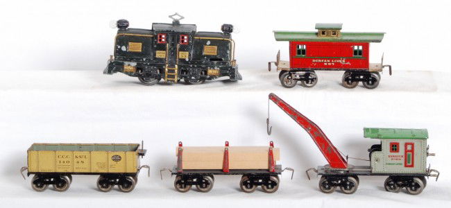 Dorfan prewar 53 loco with freight cars: Dorfan prewar O gauge 53 loco, CCC&StL 14048 gondola, flat with repro lumber, 610 derrick and 607 caboose. Missing some parts on the cars and the loco is missing the motor. Loco has some casting issue