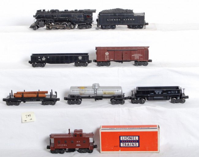 Lionel 726, 2426W, 3469, 3461, X2458, 6462, 2458,: Lionel postwar O gauge 726 Berkshire, 2426W tender, 3459 dump car, 3461 log dump car, X2458 PRR auto boxcar, 6462 NYC gondola, 2555 Sunoco tank car and a brown 2357 caboose with brown stack. Loco is 1