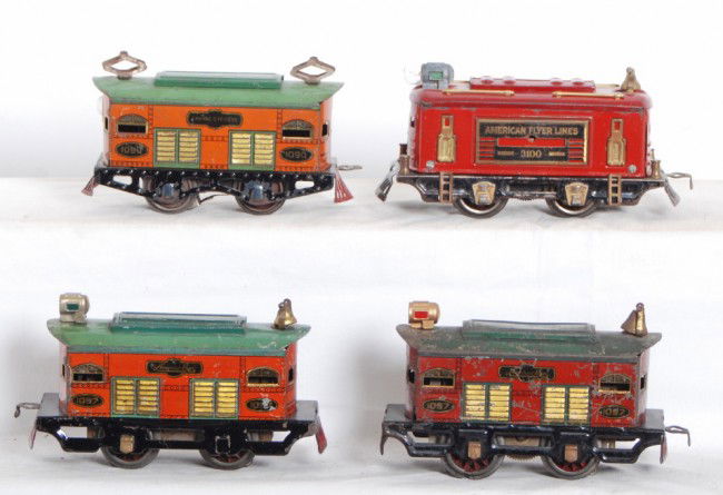 Four American Flyer electric locos, 1097, 3100, 10: Prewar American Flyer O gauge boxcab electric locos, two 1097, 3100, and a 1090. Some casting fatigue to most wheels, repro/incorrect wheels, repro trim, etc. Trains look C5-6.