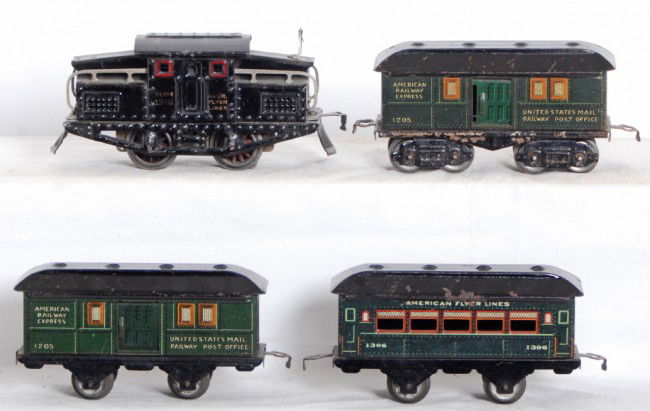 American Flyer 1218, 1205, 1205, 1306 passenger tr: Prewar American Flyer O gauge center cab electric loco, two 1205 baggage, and a 1306 passenger coach, C5-6. Some casting fatigue to some loco wheels.