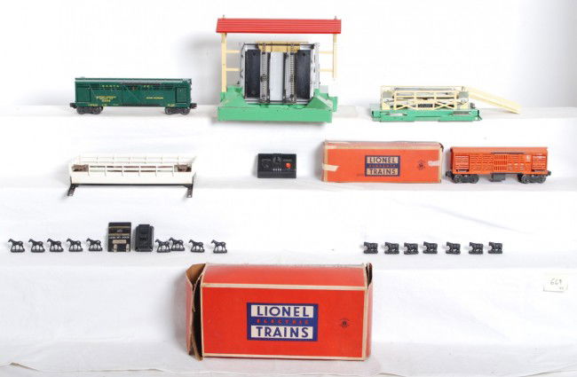 Lionel 164, 3656, 3356 in OB, 3656 in OB, 3356: Postwar Lionel O gauge accessories. 164 lumber shed, 3656 stockyard, 3656 cattle car in OB, 3356 Santa Fe horse car and 3356 corral in OB, seven cattle figures, nine horse figures, 364C, OTC Lockon, C